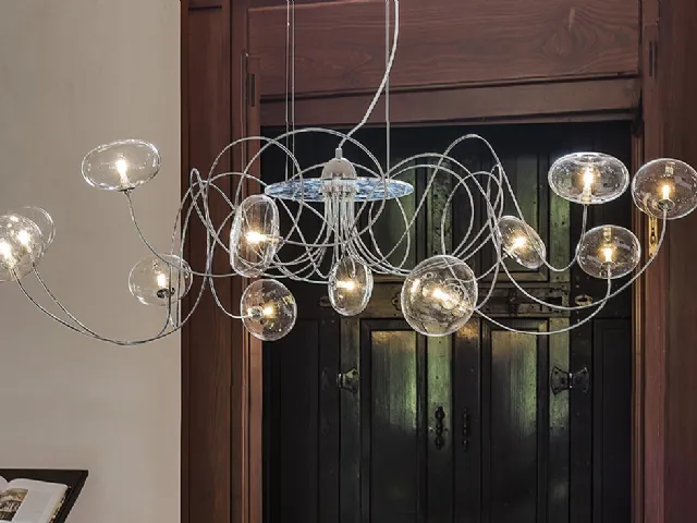 Lampada a sospensione con bracci cromati e paralumi in cristallo Oktopus di Cattelan Italia