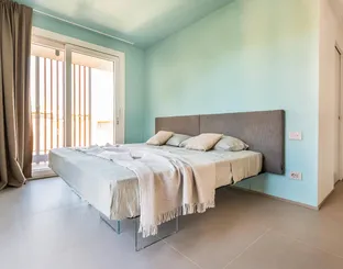 Letto Air 1507 con testiera in tessuto imbottito di Lago