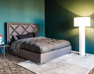 Letto contenitore in ecopelle con testiera lavorata a rombi Patrick di Cattelan Italia