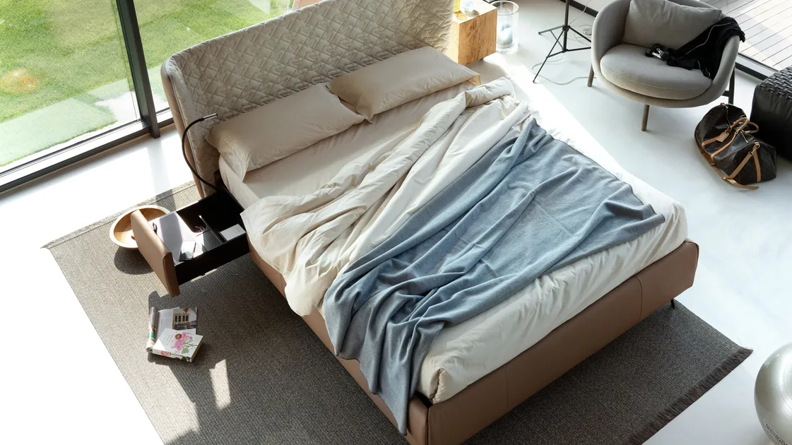 Letto in ecopelle con testiera curva e contenitore Leonte di Noctis