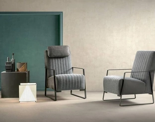 Poltrona in tessuto e pelle Angy di Samoa