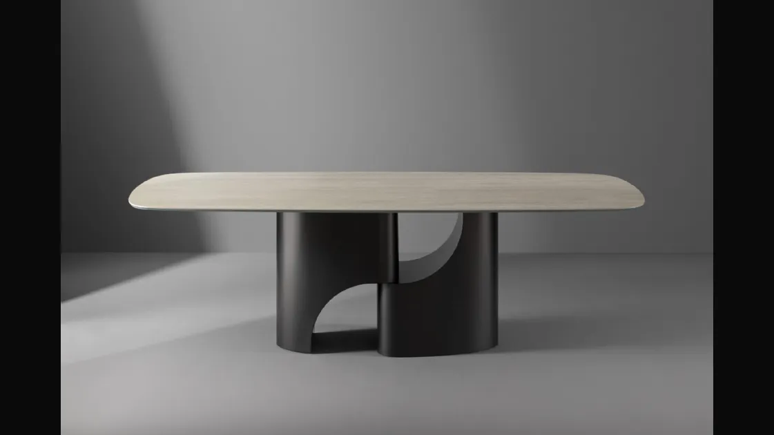 Tavolo Taijitu con piano in marmo e base in metallo di Bonaldo