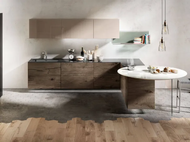 Cucina Design a isola con fuochi integrati nel piano rotondo in vetro Air Bianco lucido di Lago
